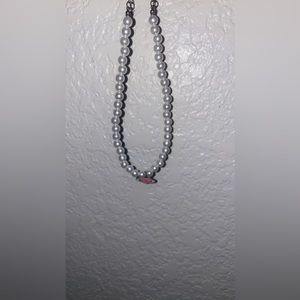 Pearl necklace with heart pendant